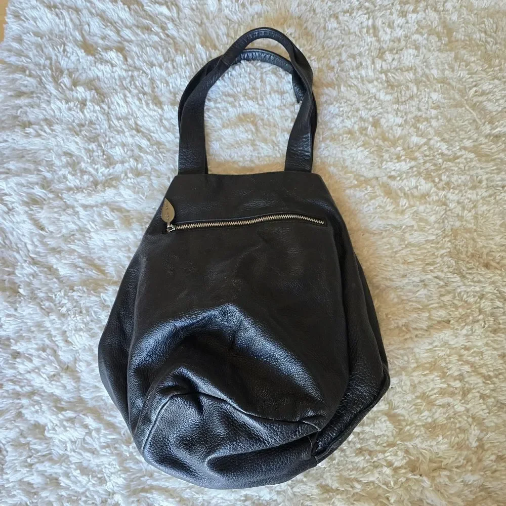 Neta Sade black leather‎ hobo purse.